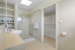 Bathtub, hair dryer, towels
