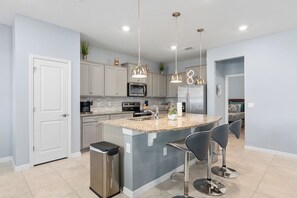 Fridge, microwave, oven, stovetop - Spacious 5BR Villa w/ Pool, Games, Near Disney! (Davenport)