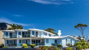 Enjoy a view of the surrounding area from the upper floor balcony.