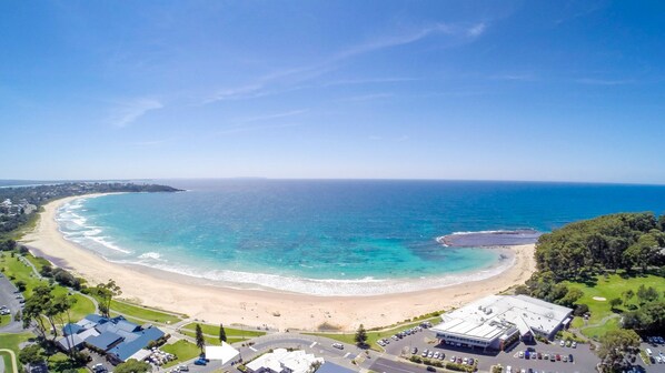 Enjoy beachfront views and easy access to a golf course from this coastal property.