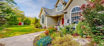Lovely home with water view, hot tub, fireplace, & washer/dryer