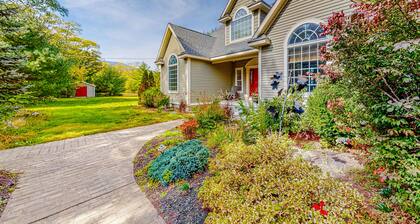 Lovely home with water view, hot tub, fireplace, & washer/dryer