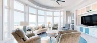 Stunning oceanfront home with pool, private boardwalk, decks, & elevator