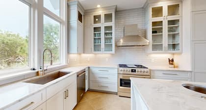 Stunning oceanfront home with pool, private boardwalk, decks, & elevator