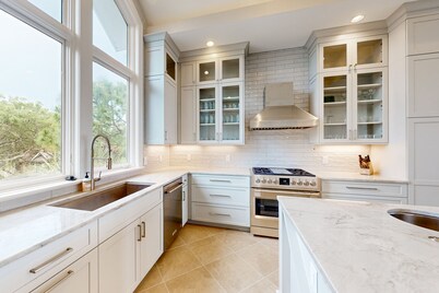 Stunning oceanfront home with pool, private boardwalk, decks, & elevator