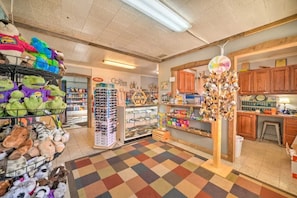 Explore a welcoming retail space filled with a variety of stuffed animals and toys on display.