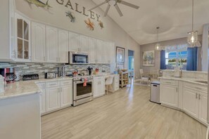 Fridge, microwave, oven, stovetop - Villa Seaside Escape, Cape Coral, FLA · NO Pet Fee/FREE Htd Pool/Smart TVs/4 Kayaks/Bikes (Cape Coral)