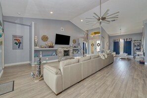 Smart TV, fireplace, books, offices