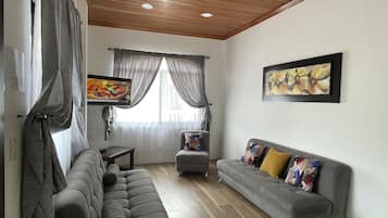 Apartment, 2 Bedrooms, Balcony | Living area | 38-cm flat-screen TV with satellite channels, TV