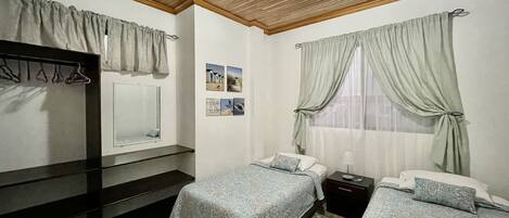 Premium bedding, laptop workspace, free WiFi, bed sheets