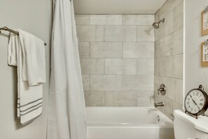 Combined shower/tub, hair dryer, bidet, towels