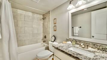 Combined shower/tub, hair dryer, bidet, towels