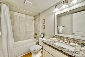 Combined shower/tub, hair dryer, bidet, towels