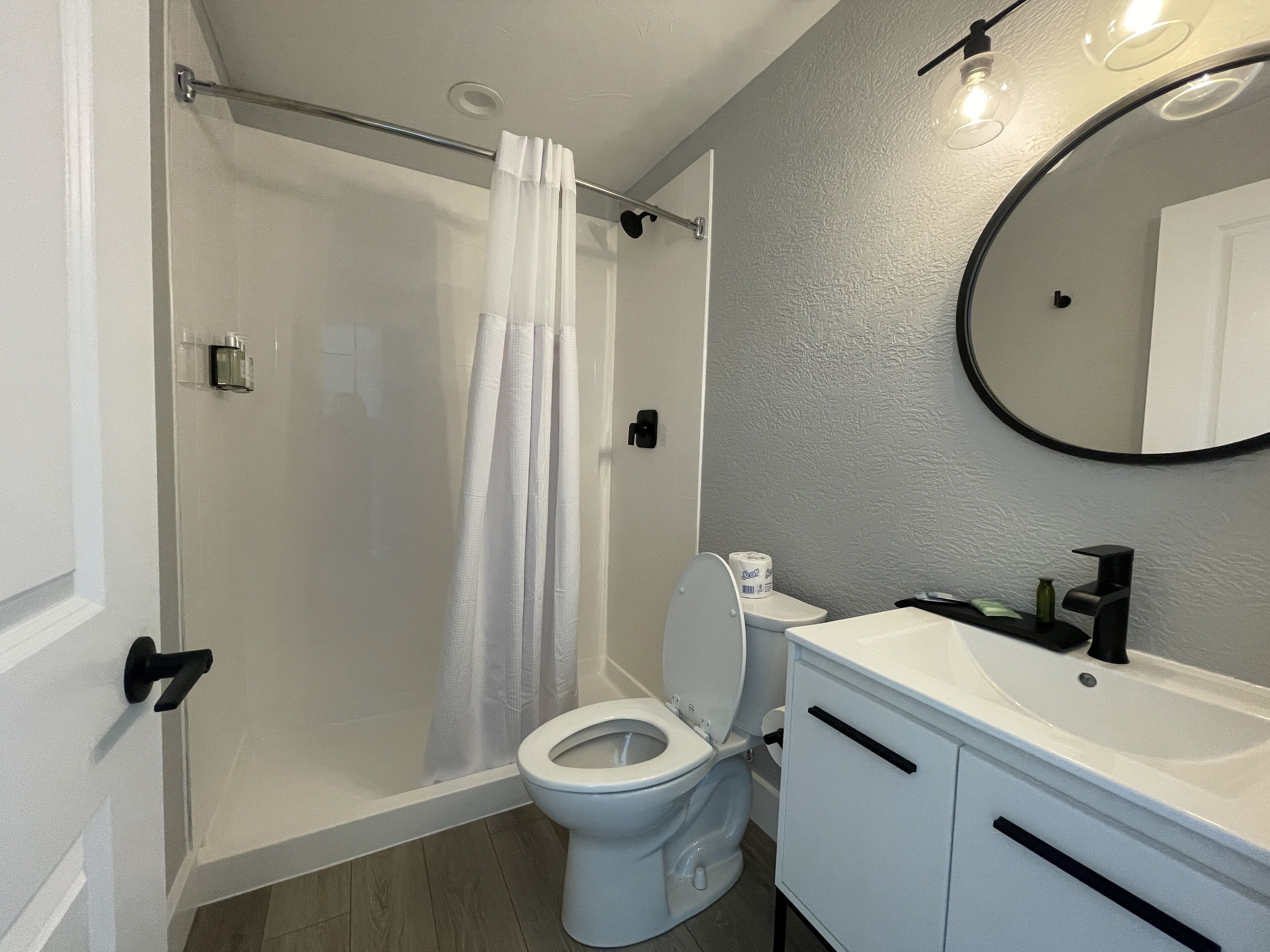 Hair dryer, towels, soap, shampoo