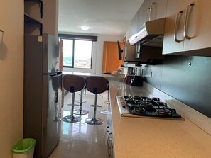 Fridge, microwave, oven, cookware/dishes/utensils