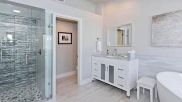 Bathtub, hair dryer, towels, soap