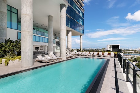 Outdoor pool, open 8:00 AM to 8:00 PM, cabanas (surcharge)
