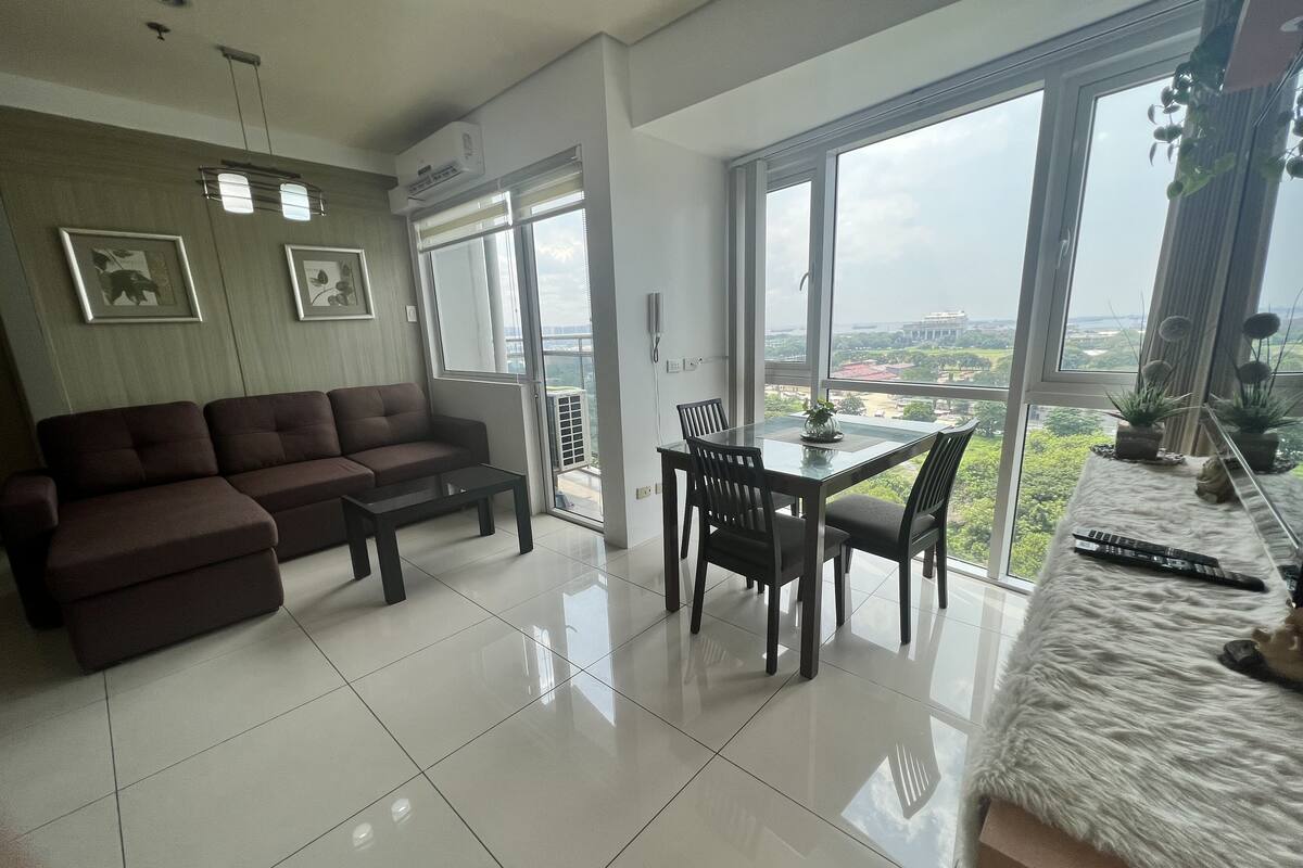 Deluxe Condo, Ensuite, Partial Ocean View | Living area