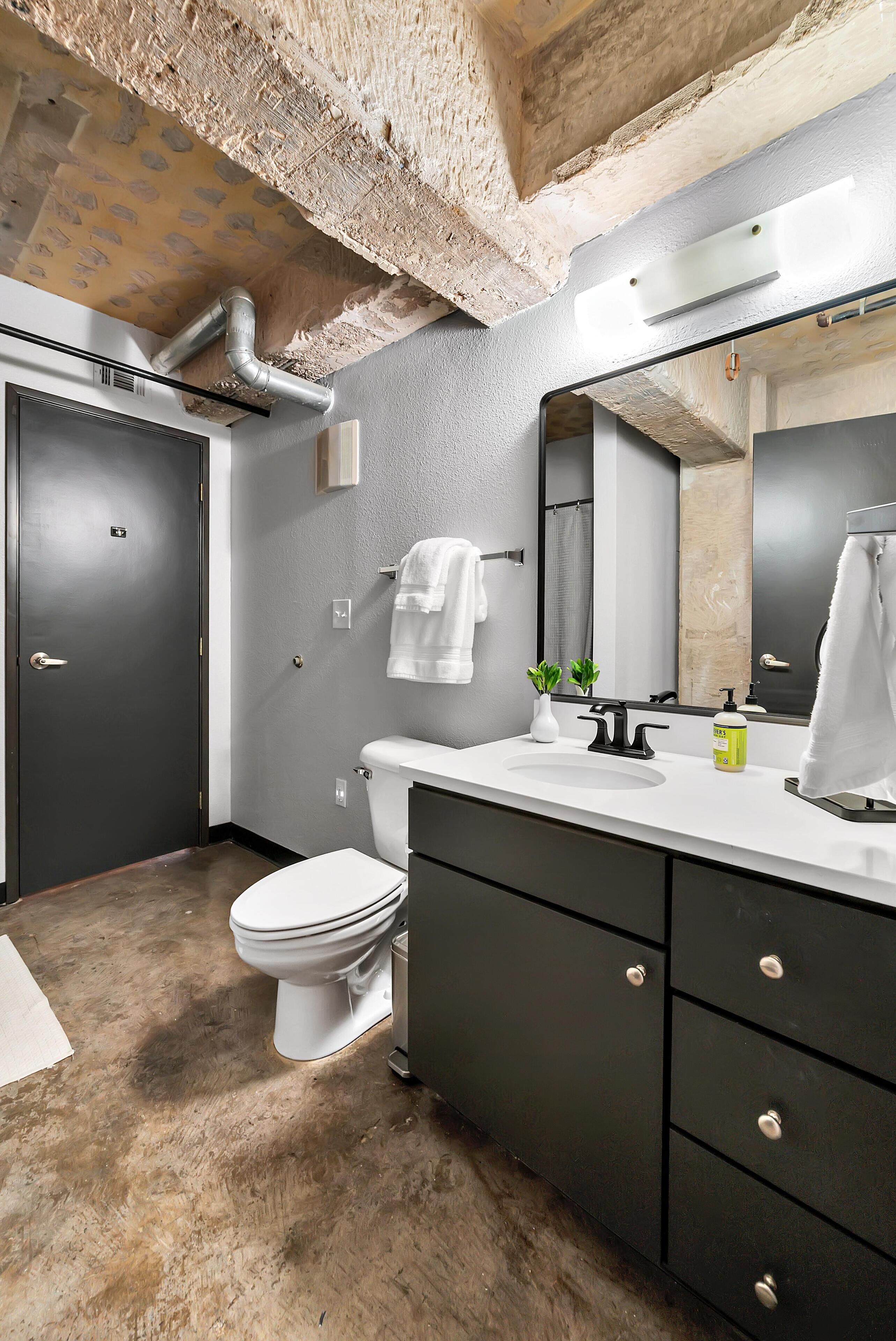 Combined shower/tub, hair dryer, towels, soap
