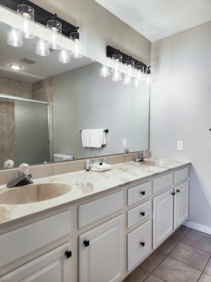 Shower, towels, soap, toilet paper