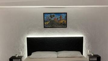 Habitación clásica (Zapoteca) | Cortinas blackout, tabla de planchar con plancha y wifi gratis