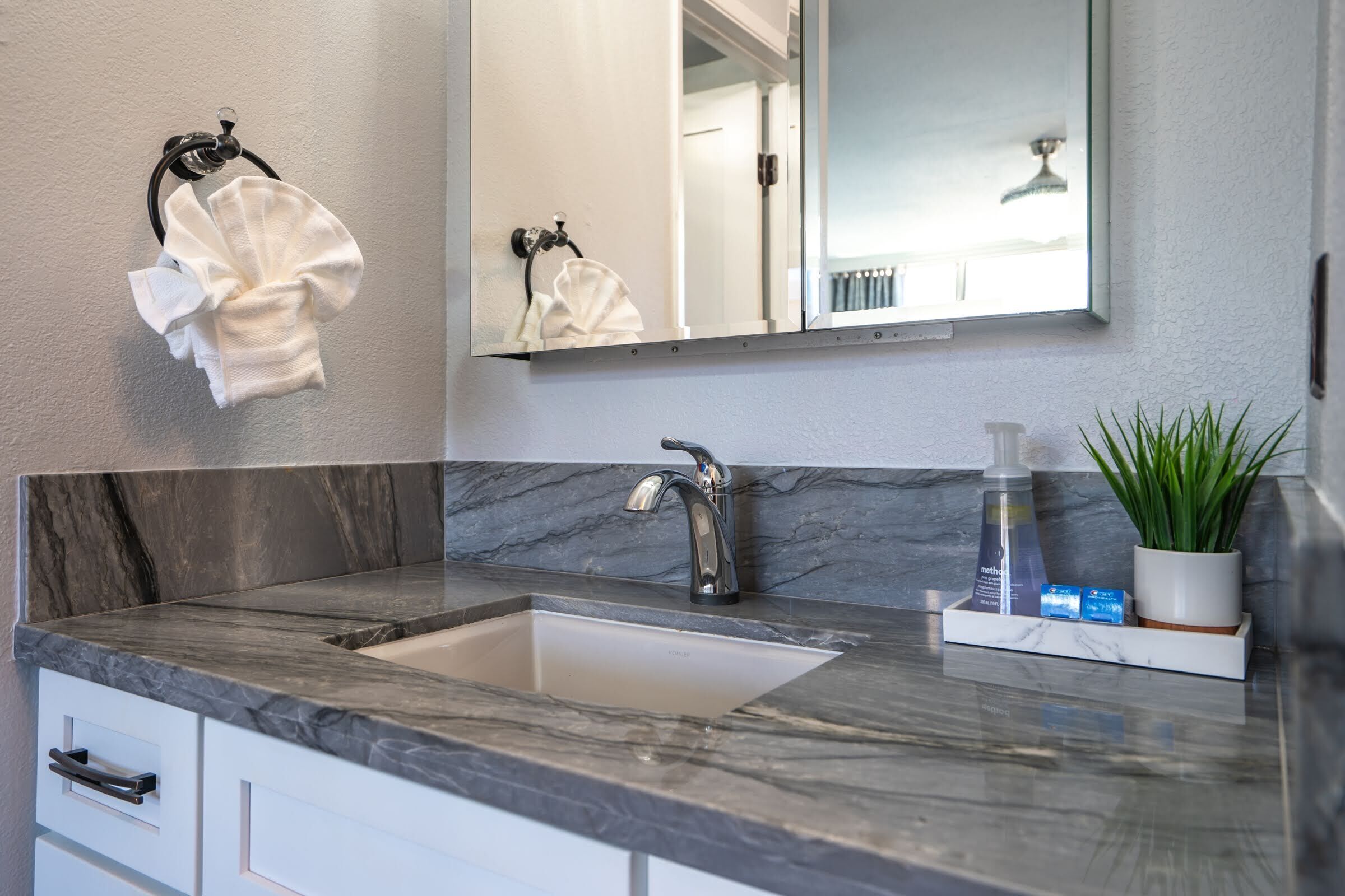 Bathtub, hair dryer, towels, soap