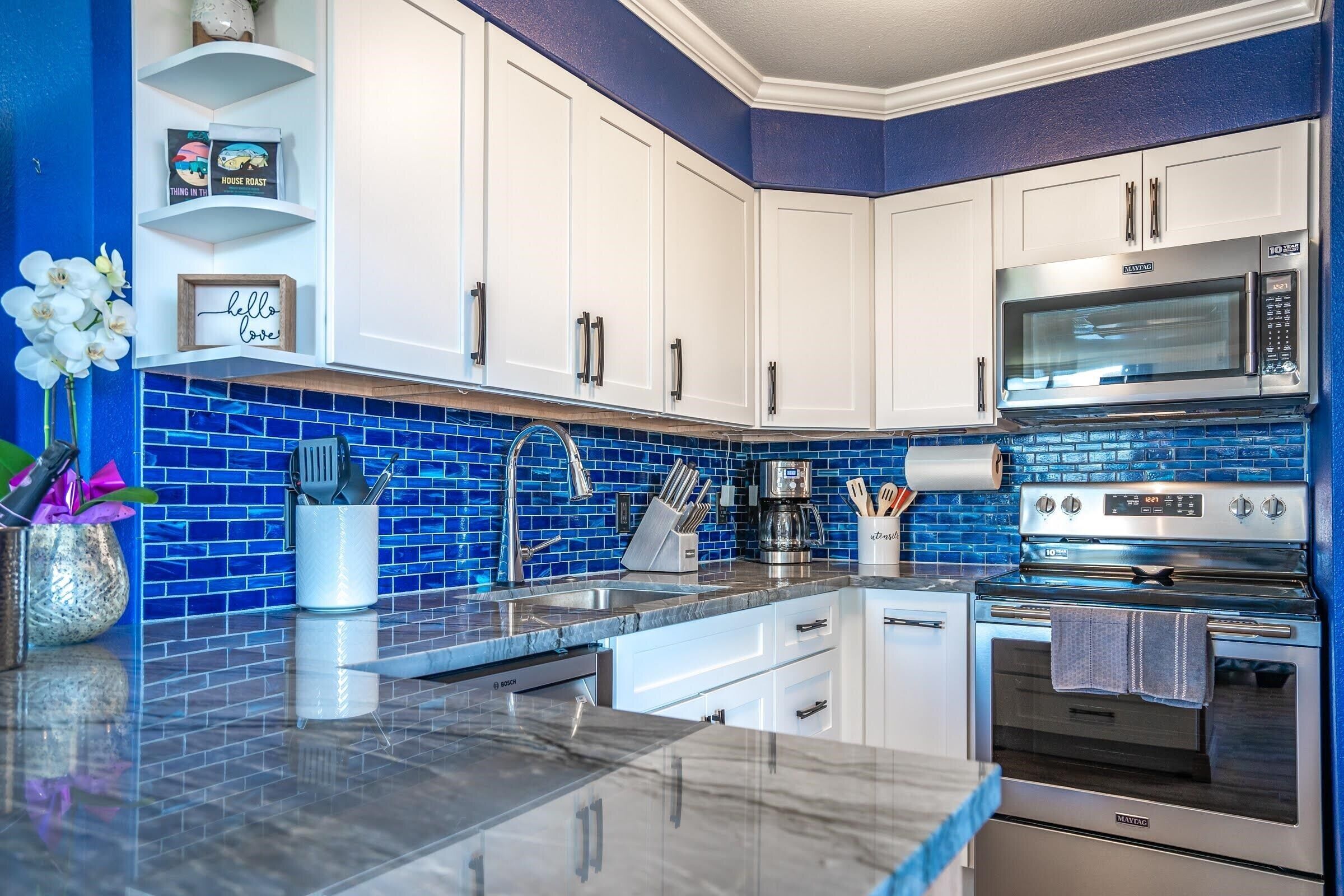 Microwave, stovetop, blender, cookware/dishes/utensils