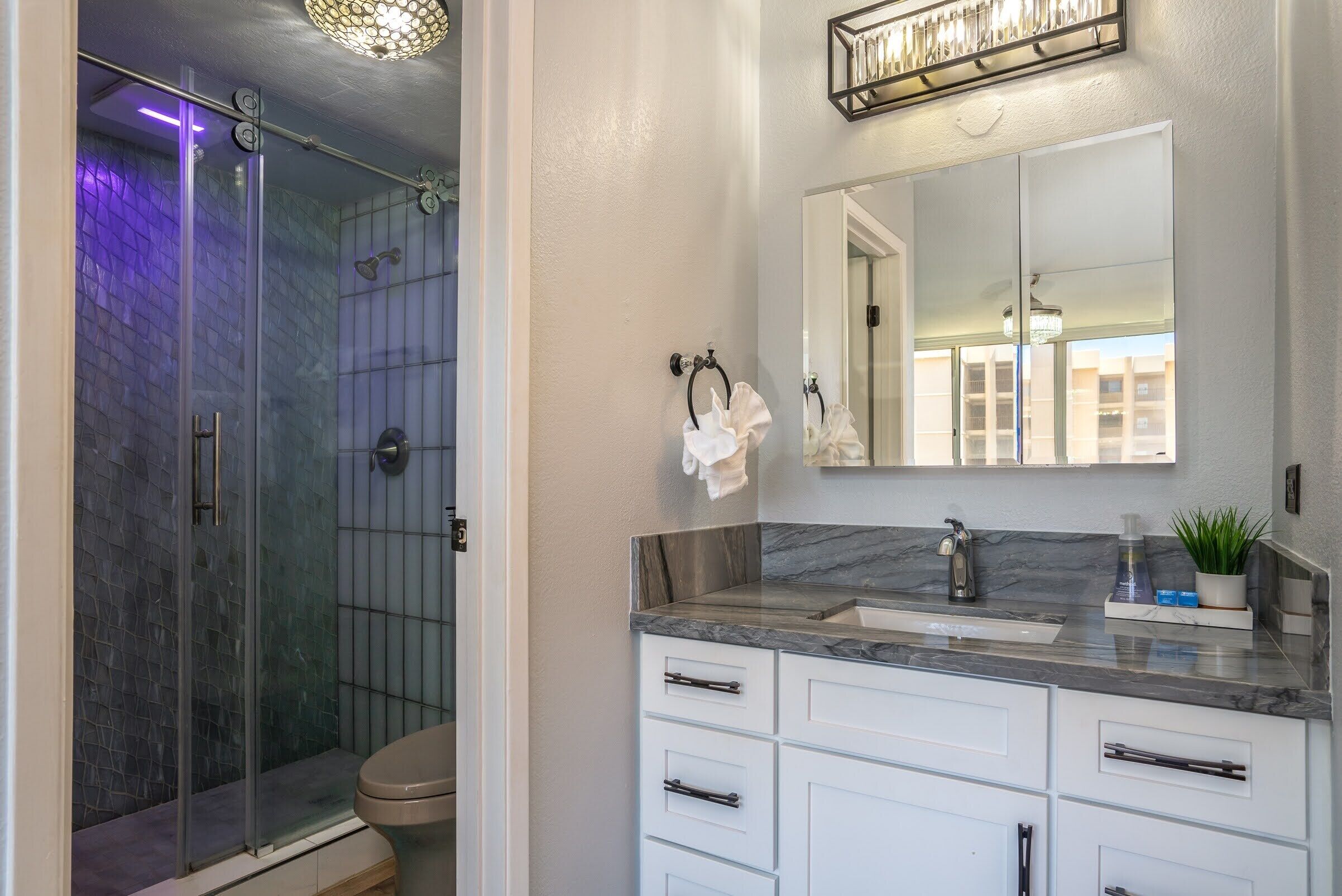 Bathtub, hair dryer, towels, soap