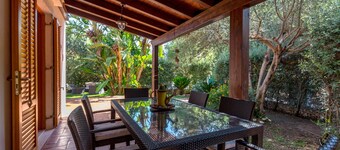 "Villetta Cala Rossa" con jardín, terraza y aire acondicionado