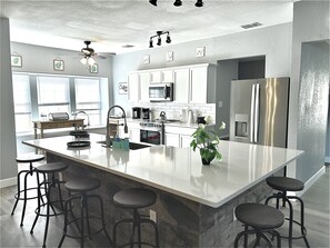 Fridge, microwave, dishwasher, cookware/dishes/utensils