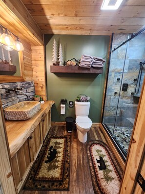 Combined shower/tub, hair dryer, towels, soap