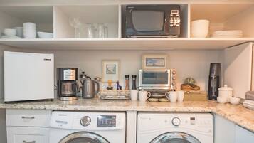 Fridge, microwave, coffee/tea maker, toaster