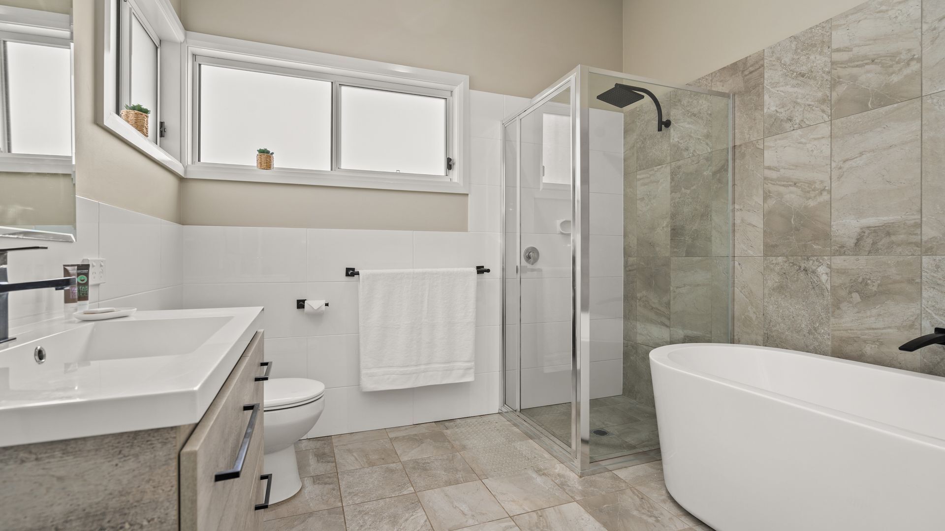 Bathtub, towels, shampoo