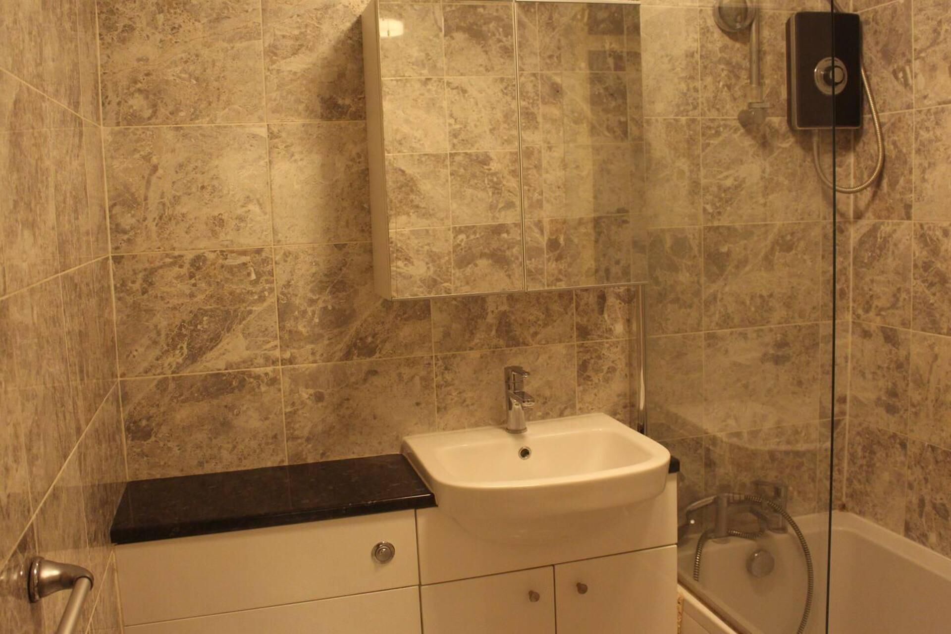Apartment, 1 King Bed | Bathroom | Combined shower/bathtub, deep-soaking bathtub, hair dryer, towels