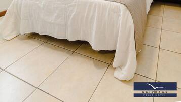 Suíte família | Roupas de cama premium, camas com colchões pillow-top, frigobar