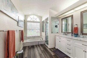 Bathtub, hair dryer, towels, soap
