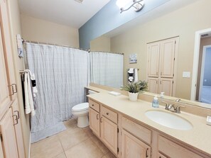 Combined shower/bathtub, hair dryer, towels, soap