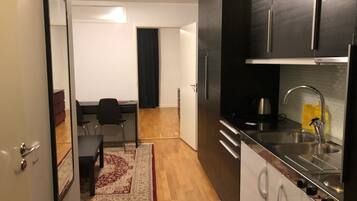 Lägenhet - 2 enkelsängar | Eget kök | Kylskåp, mikrovågsugn, spishäll och vattenkokare