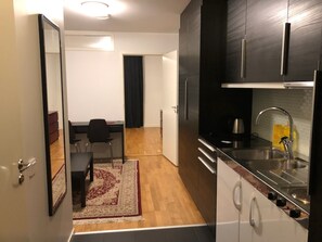 Lägenhet - 2 enkelsängar | Eget kök | Kylskåp, mikrovågsugn, spishäll och vattenkokare
