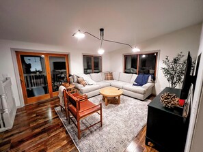 Smart TV, fireplace, foosball, books