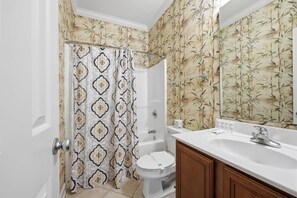 Bathtub, hair dryer, towels