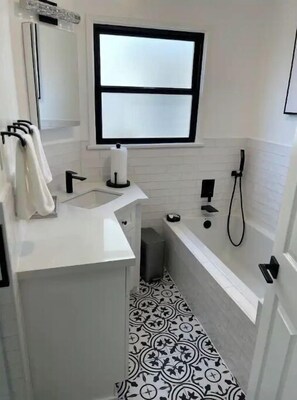 Shower, towels, soap, toilet paper