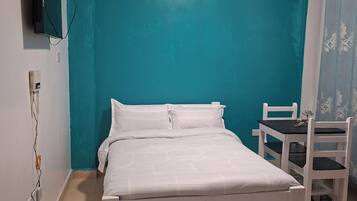 1 quarto, acesso Ă internet, roupa de cama