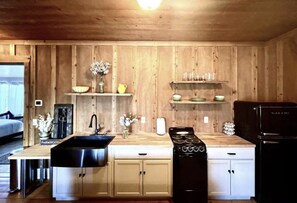 Fridge, microwave, oven, stovetop - “The Mercantile” is a farmhouse style home on Morning Line Ranch. (New Harmony)