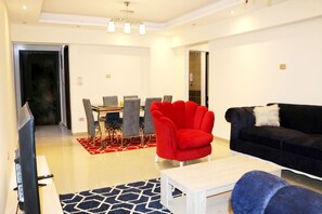 Apartment | Living room - Red Flower in Palm City Compound 1 Hour to the sea (Cairo)
