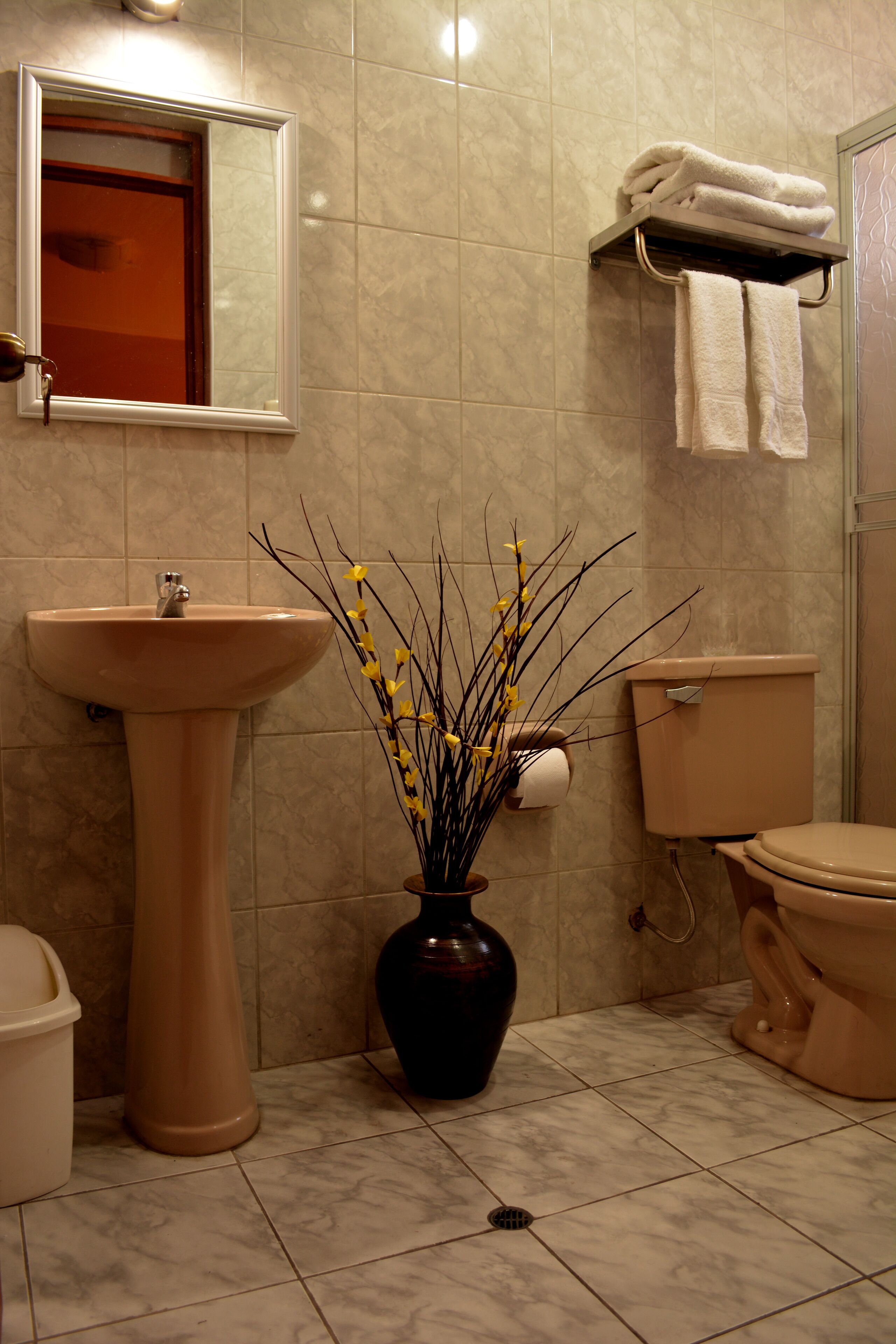 family triple room, mixed dorm, city view | bathroom | rainfall showerhead, free toiletries, towels