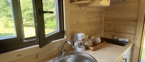 Fridge, microwave, stovetop, coffee/tea maker