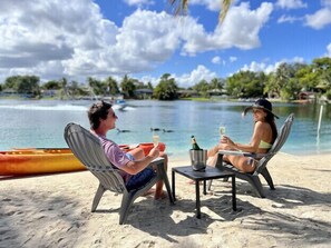 On the beach, sun loungers, beach towels