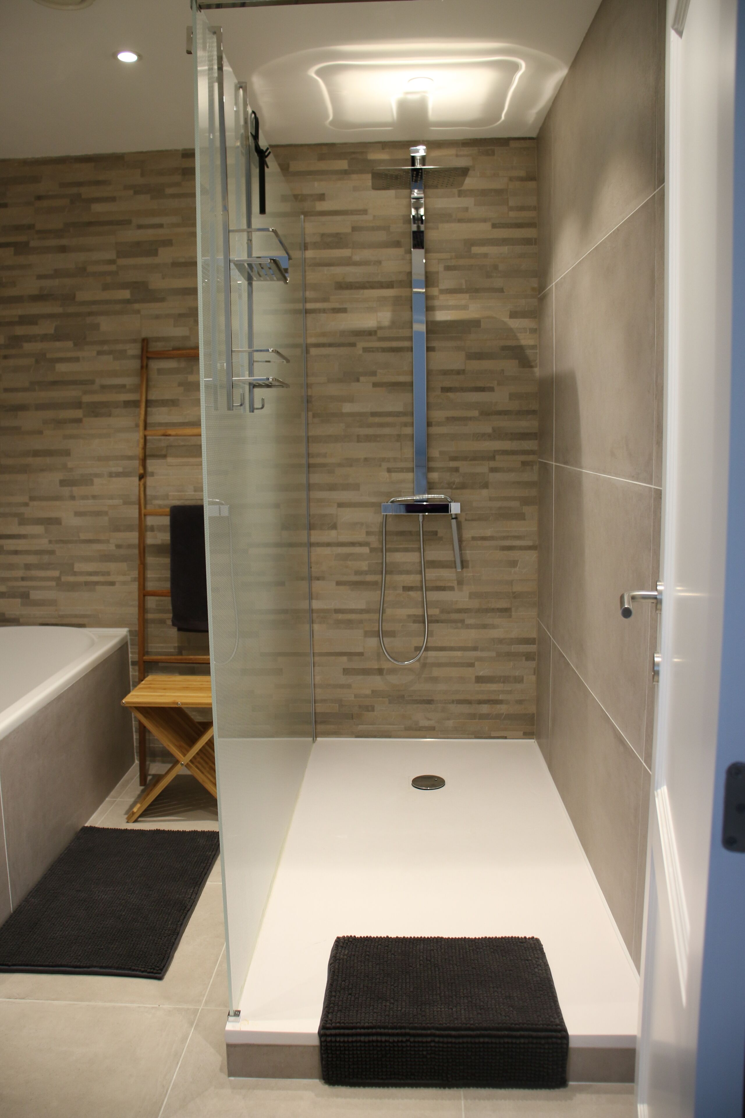Bathtub, hair dryer, towels, soap