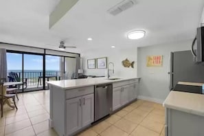 Condo, 1 King Bed with Sofa bed, Patio (Windward Passage - No Pets Allowed) | Private kitchen | Fridge, microwave, dishwasher, coffee/tea maker - Laguna Reef 2 by Miss Kitty’s (Rockport)